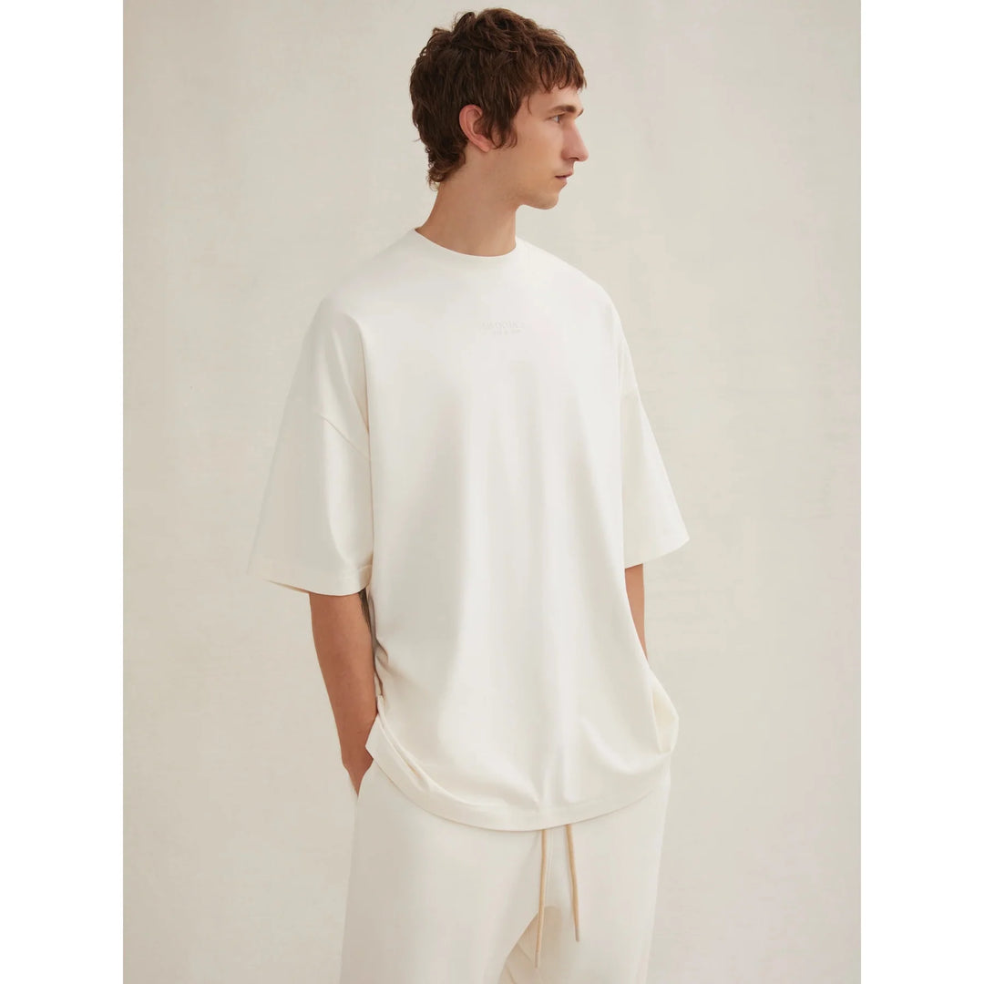 FEAR OF GOD FOG ESSENTIALS T-Shirt - Cloud Dancer (FW23)